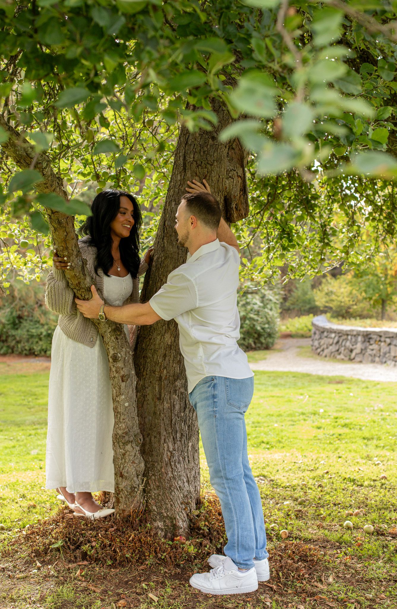 Seattle engagement photographer capturing a couple during an outdoor Discovery Park engagement photoshoot