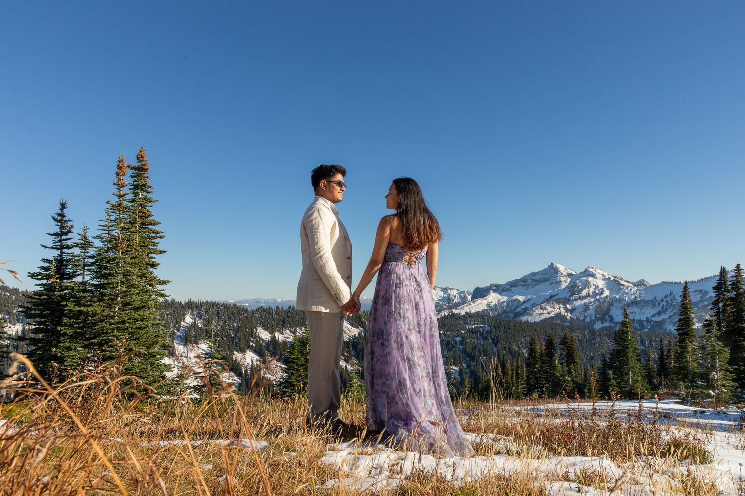 Seattle engagement photographer photographing a joyful couple during their Mount Rainier engagement session