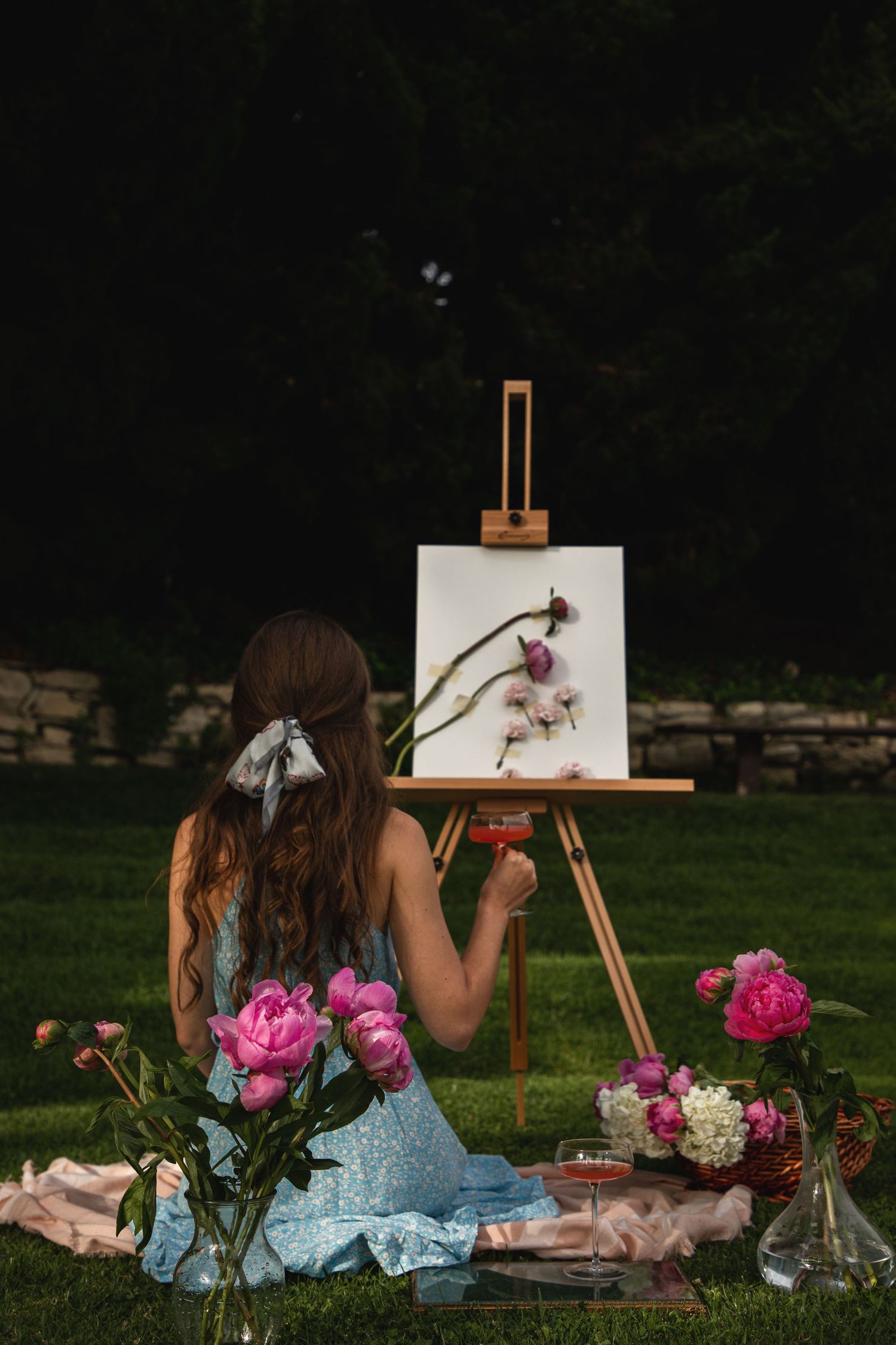 Seattle portrait photographer capturing a woman’s portrait session with peonies