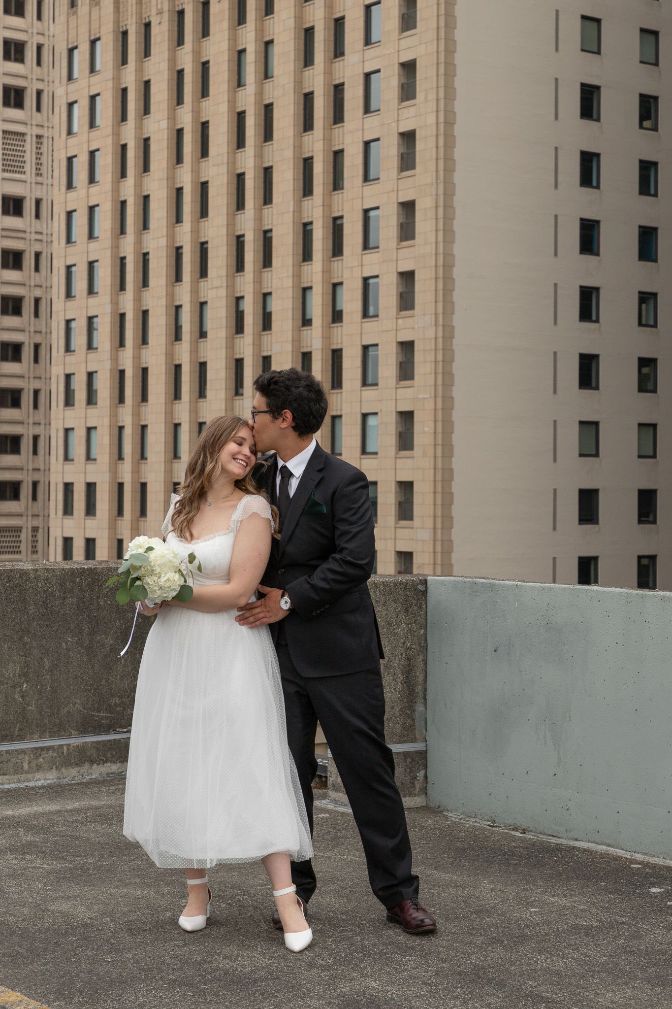 Intimate Seattle municipal courthouse elopement with newlyweds walking around the city for post‑ceremony photos