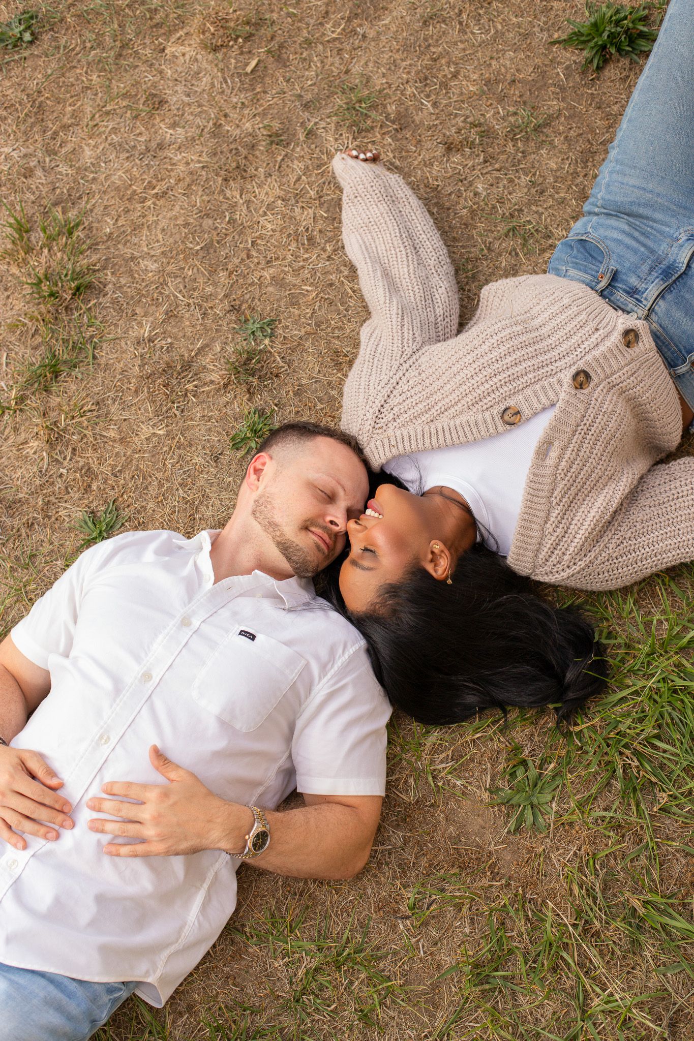 Romantic engagement portraits at Discovery Park, Seattle couple embracing during their engagement session