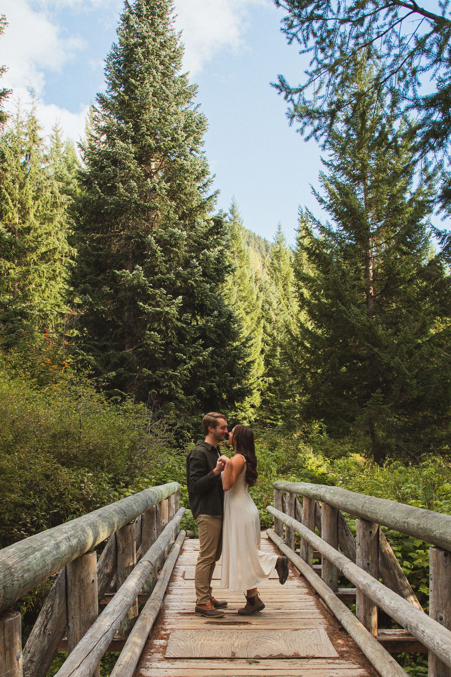 Seattle couples photographer capturing intimate moments during a Gold Creek Pond couple photoshoot