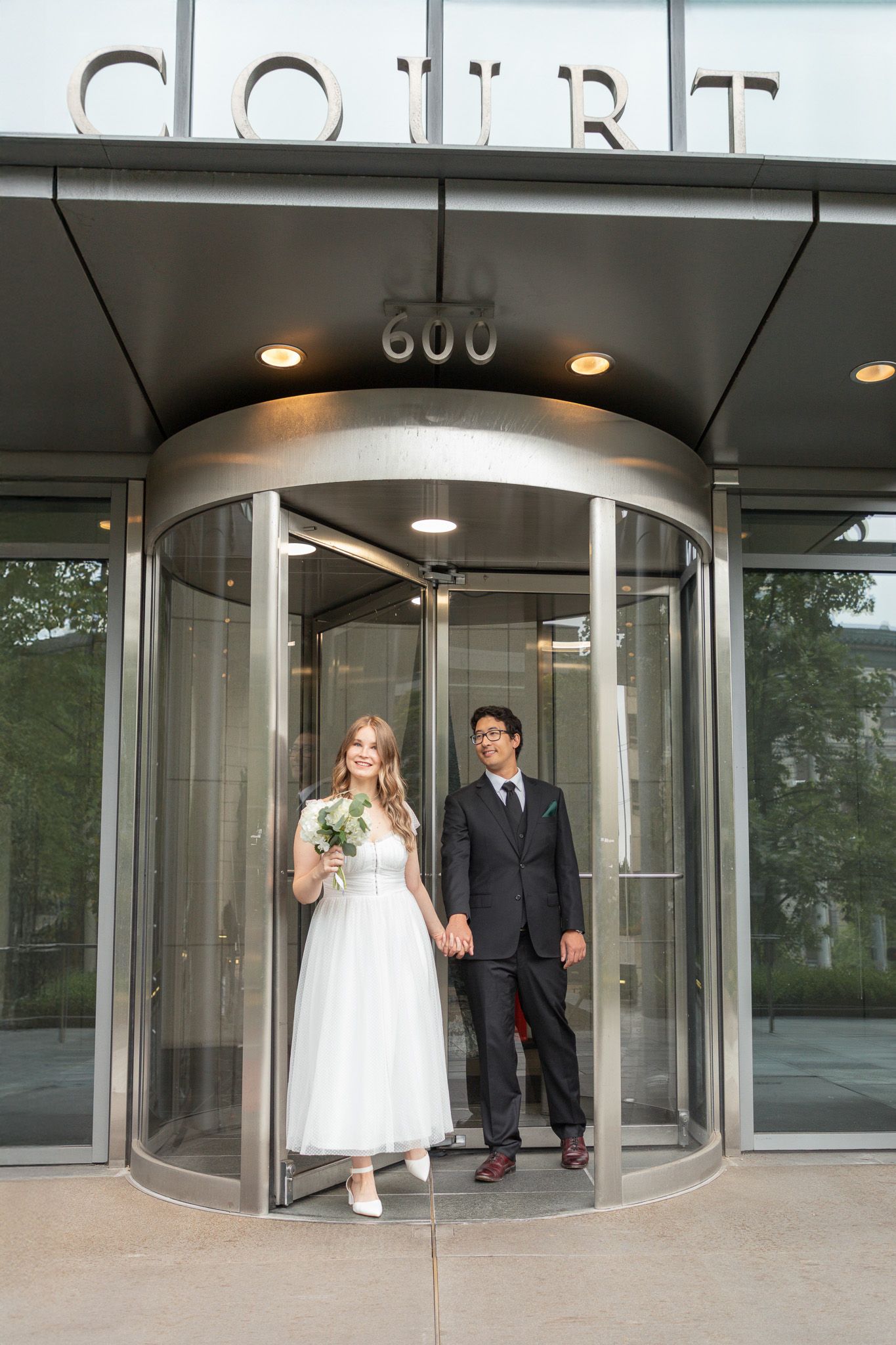 Seattle elopement photographer capturing an intimate courthouse wedding at Seattle Municipal Court downtown