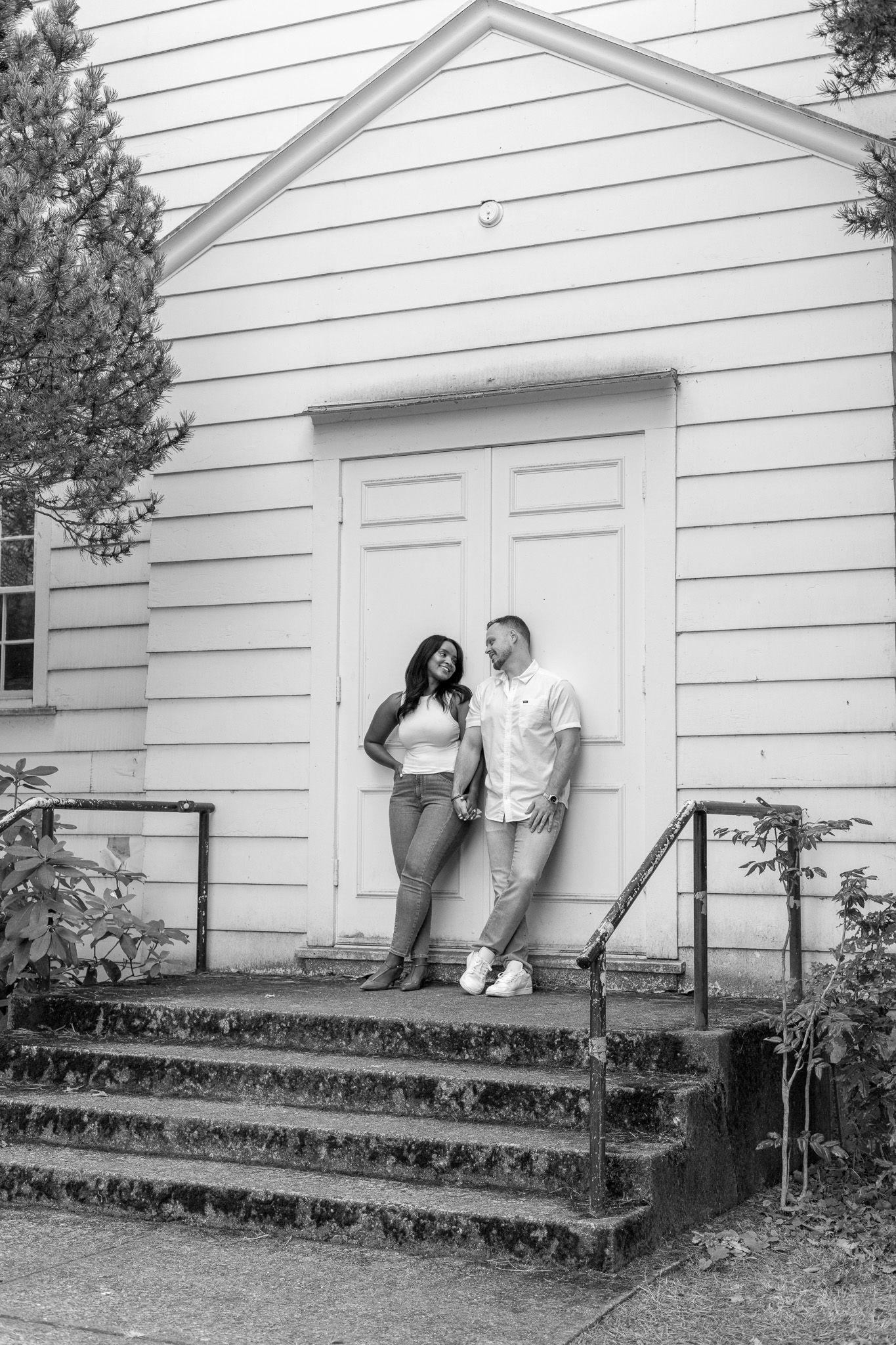 Seattle engagement photographer capturing a couple during an outdoor Discovery Park engagement photoshoot