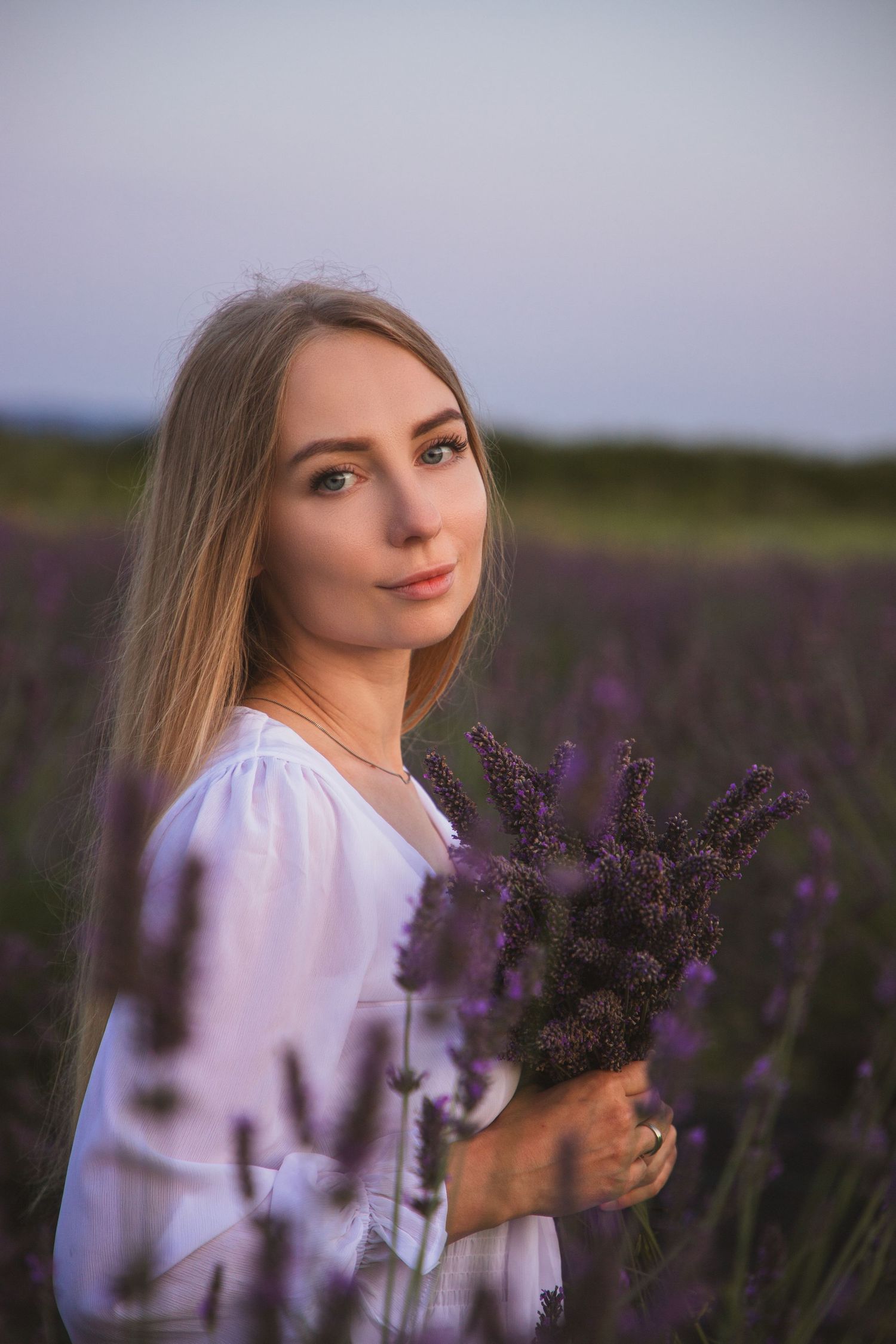Woman’s portrait photoshoot at a lavender farm, dreamy lavender field portraits in Seattle