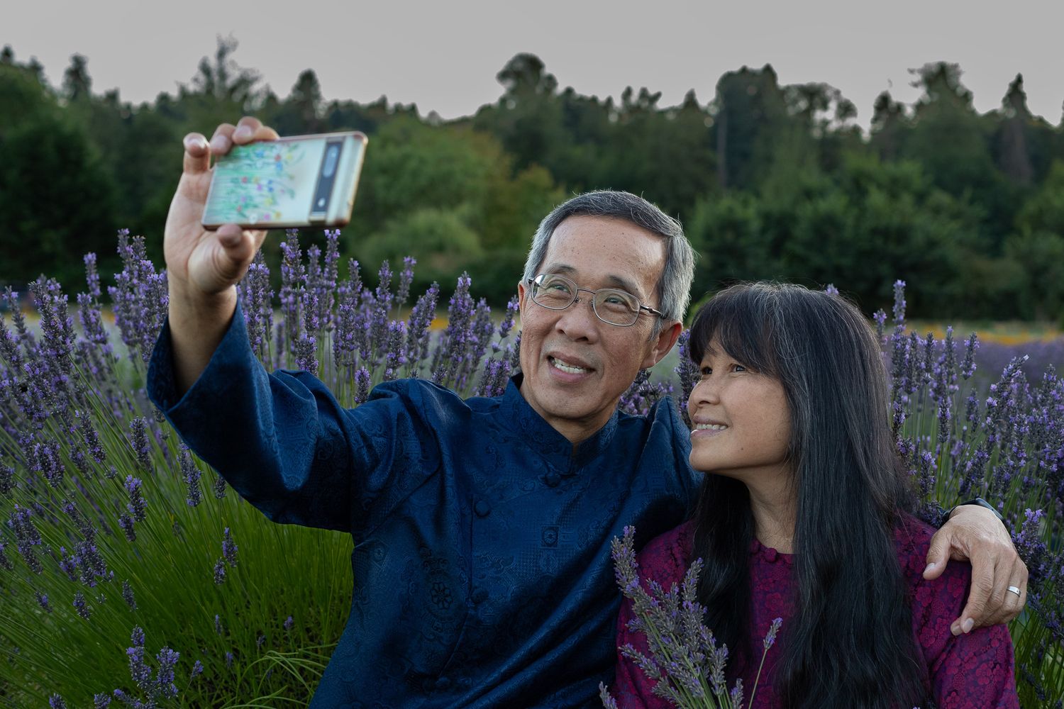 Seattle couples photographer photographing an intimate anniversary session among purple lavender rows in Woodinville WA