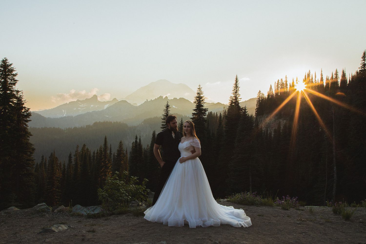 Seattle elopement photographer capturing a golden hour elopement photoshoot at Tipsoo Lake with Mount Rainier in the background
