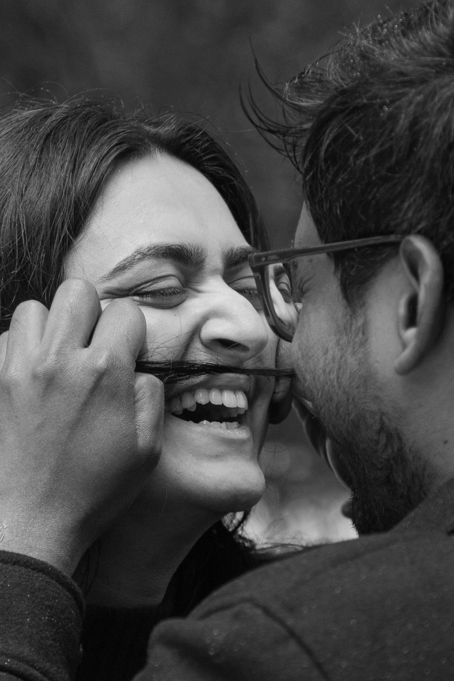 Couple laughing together during outdoor photoshoot, Washington
