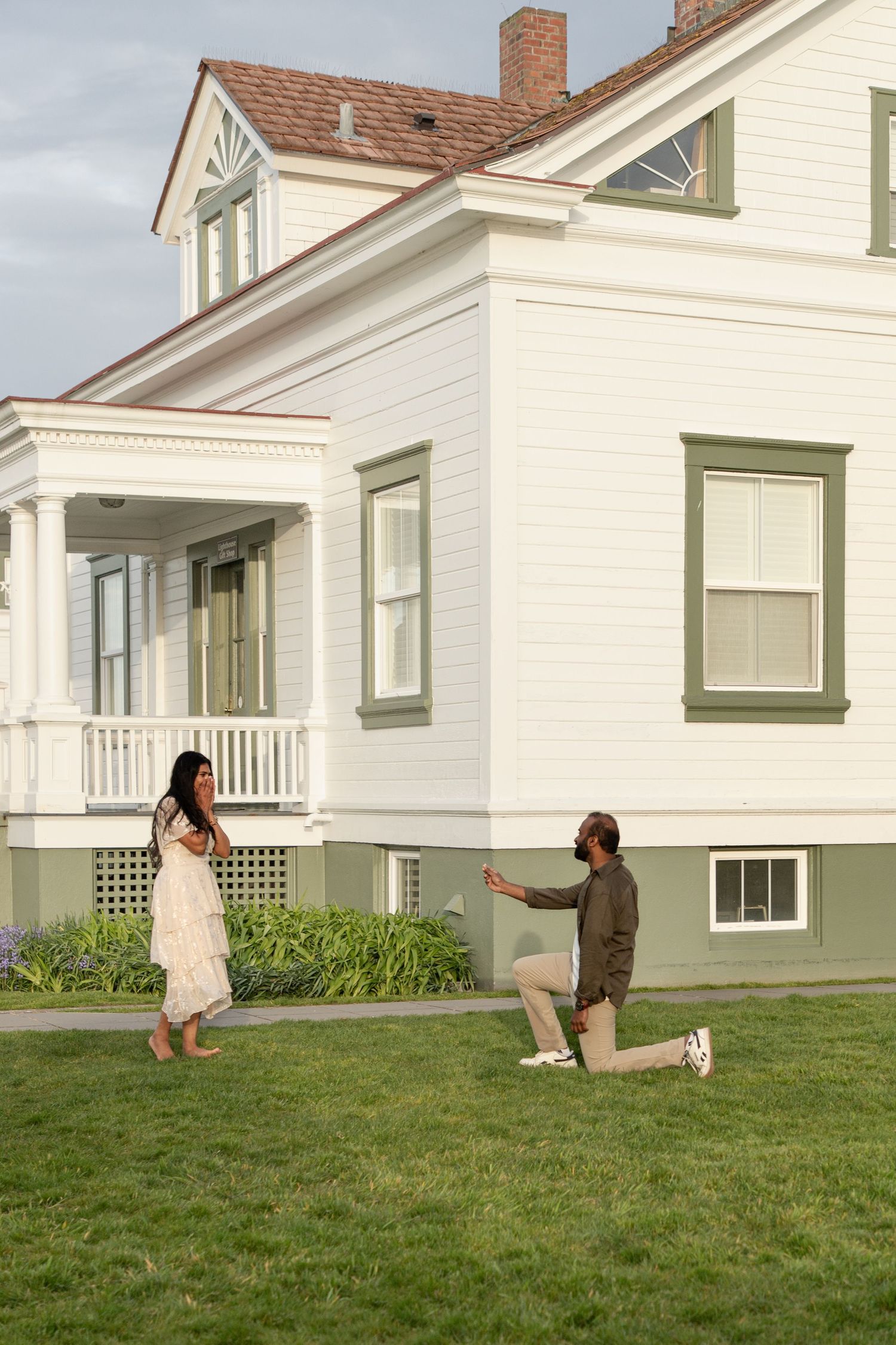Surprise marriage proposal on the lawn at Mukilteo Lighthouse Park in Washington