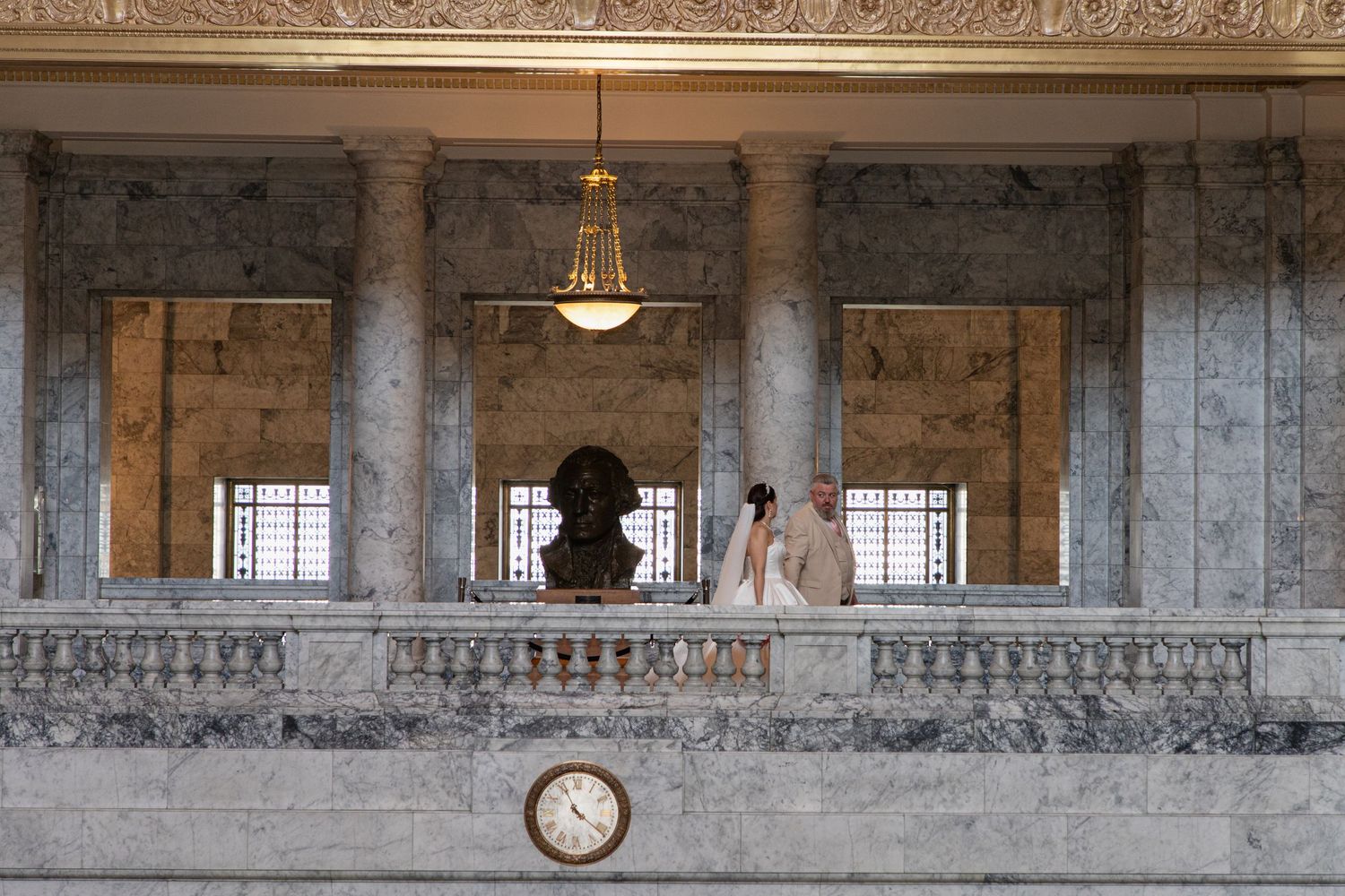 Bride and groom during an intimate Olympia Capitol elopement inside the historic Washington State Capitol rotunda