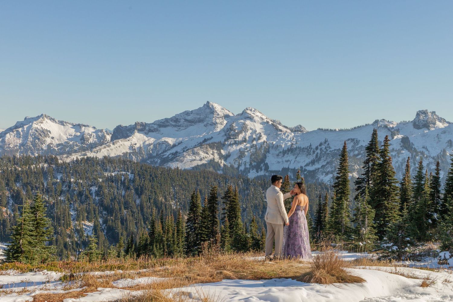 Seattle engagement photographer capturing a couple during an engagement photoshoot at Mount Rainier National Park with mountain views