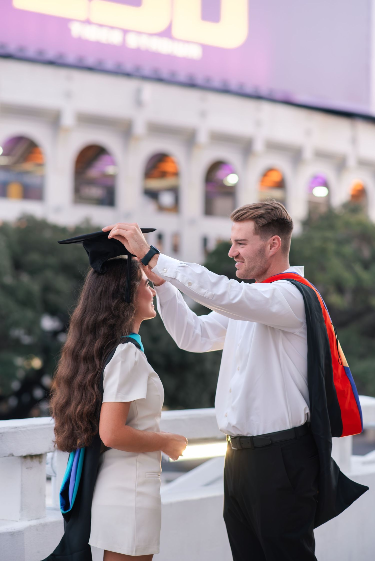 Louisiana State University graduate poses at LSU PMAC in Baton Rouge, Louisiana.