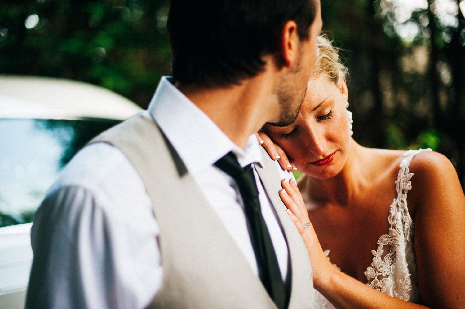 Intimate wedding moments captured in soft natural lighting outdoors.