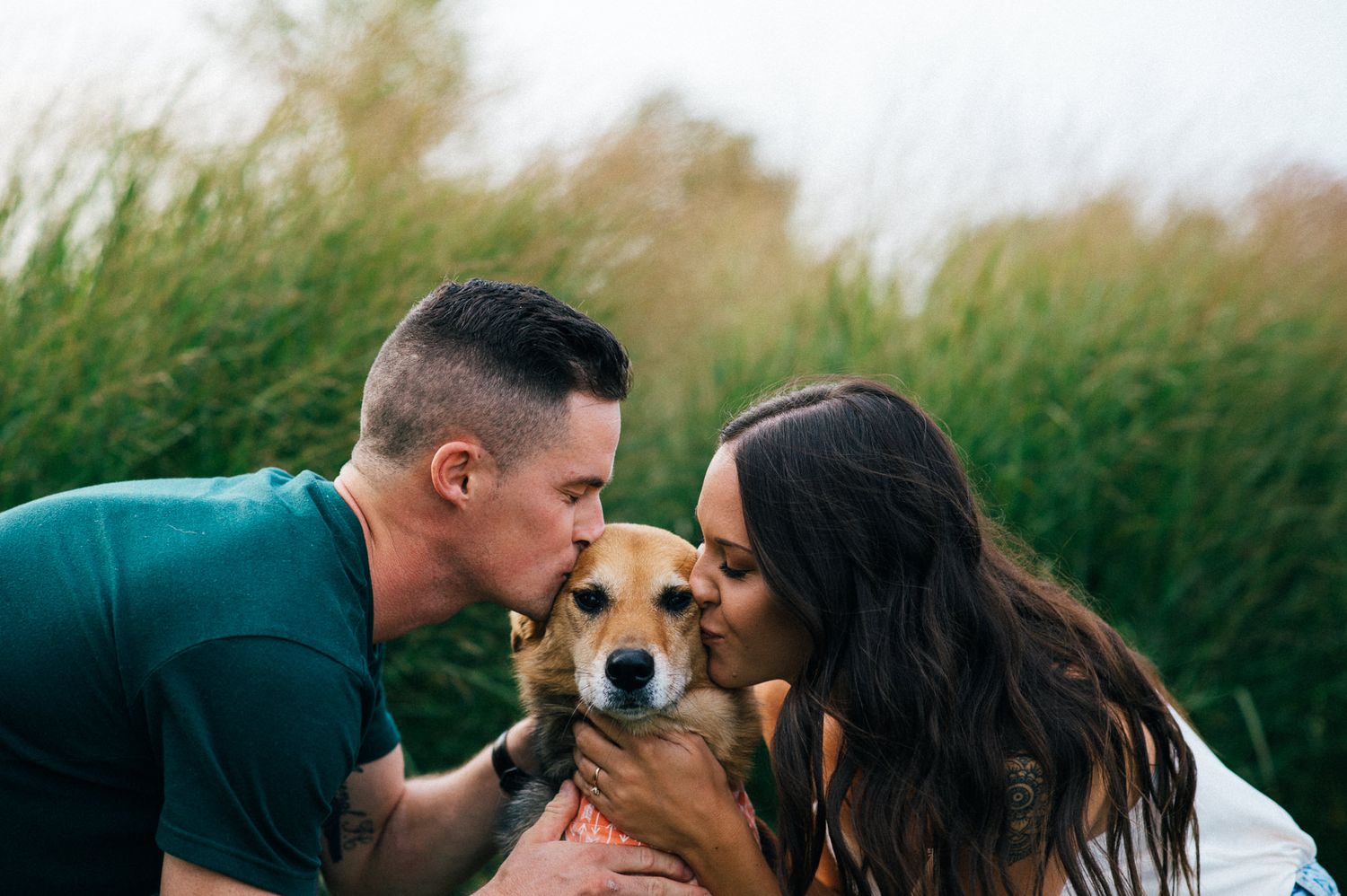 Romantic outdoor photo sequence with couple sharing intimate moments in natural setting.