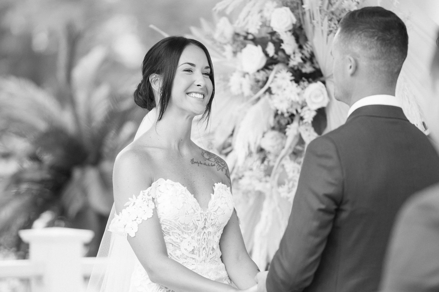 Black and white candid wedding portraits showing joyful moments.