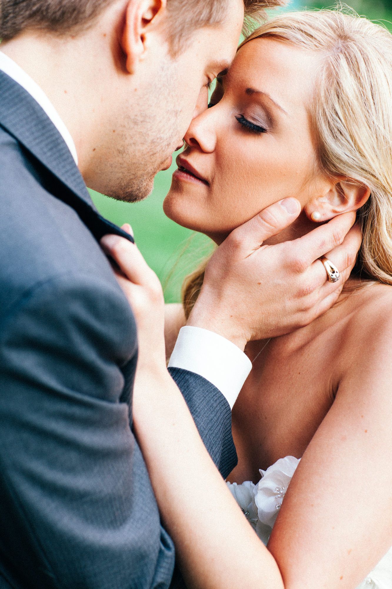 Intimate close-up series of a romantic moment between newlyweds.