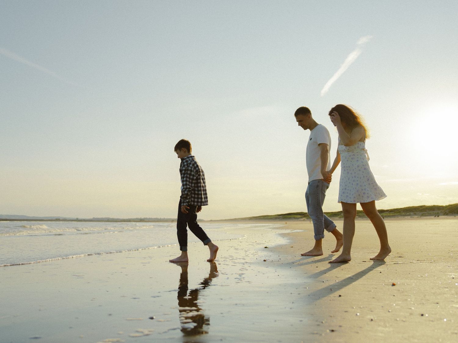 Taras and Ross wore jeans, white t-shirt and check shirt while Tetiana wore a floral blue/white mini-dress. Creating a matching look.