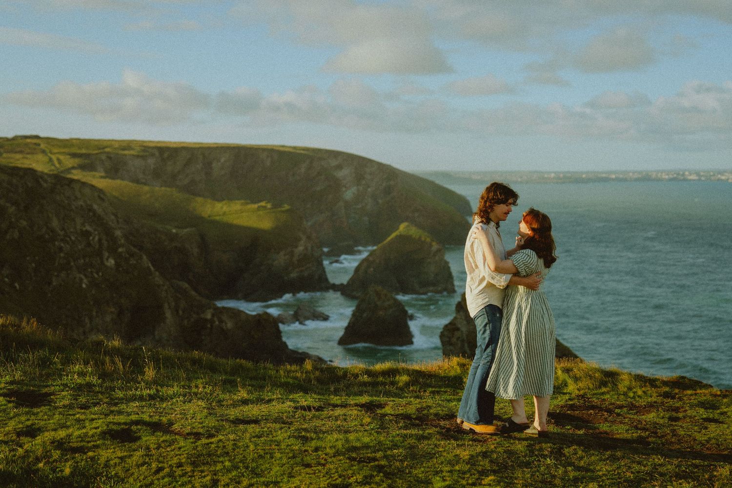 Zoe wore a green striped midi dress, Will wore jeans and a loose linen shirt