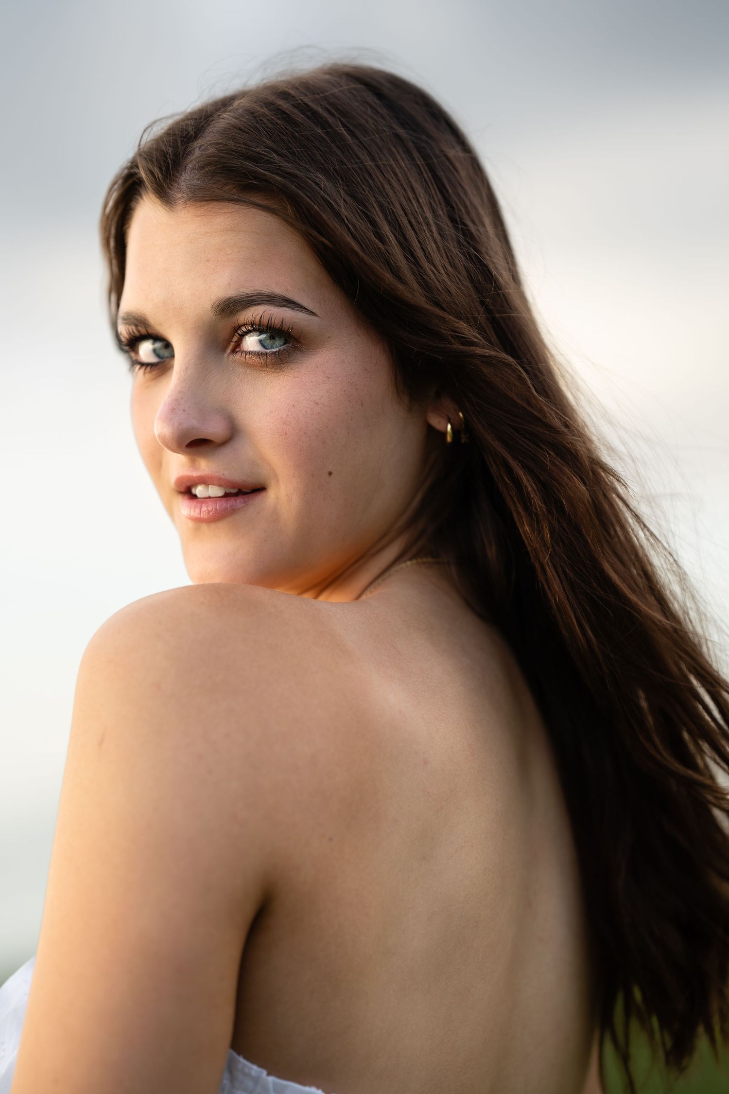 Artistic portrait series featuring soft lighting and natural poses.