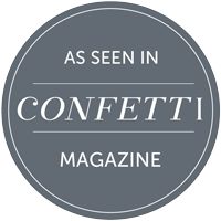 Circular grey badge reading As Seen In Confetti Magazine.