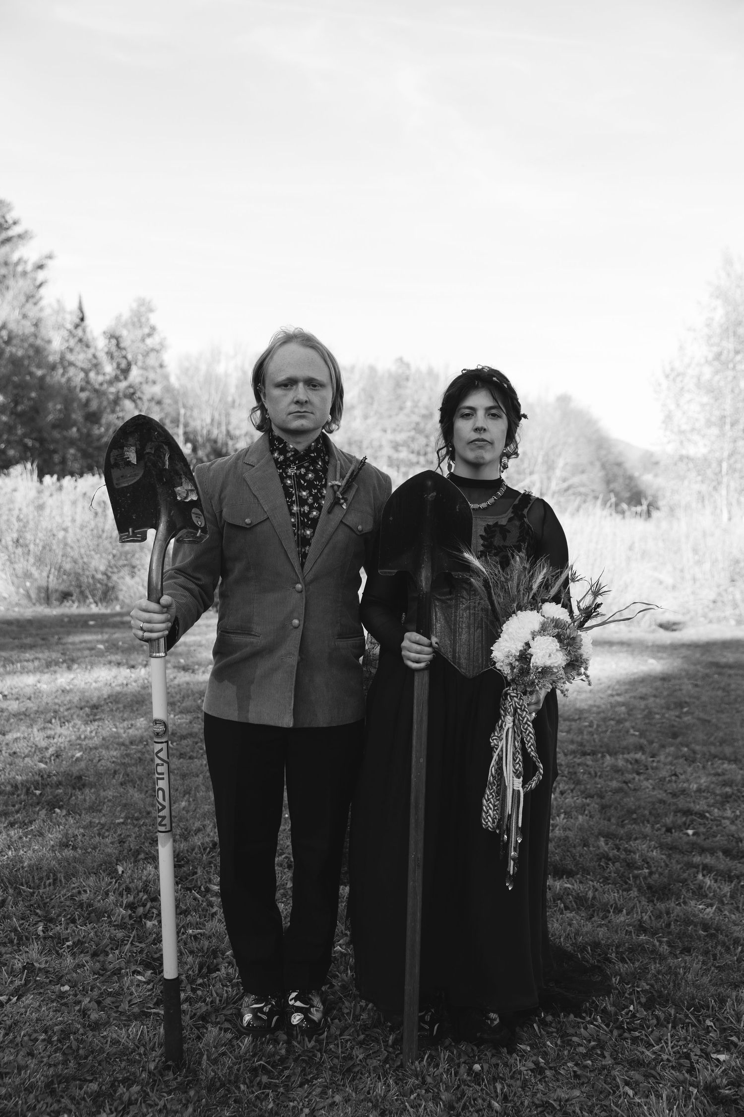 A black and white photo series showing three elderly figures standing outdoors with walking sticks or canes.