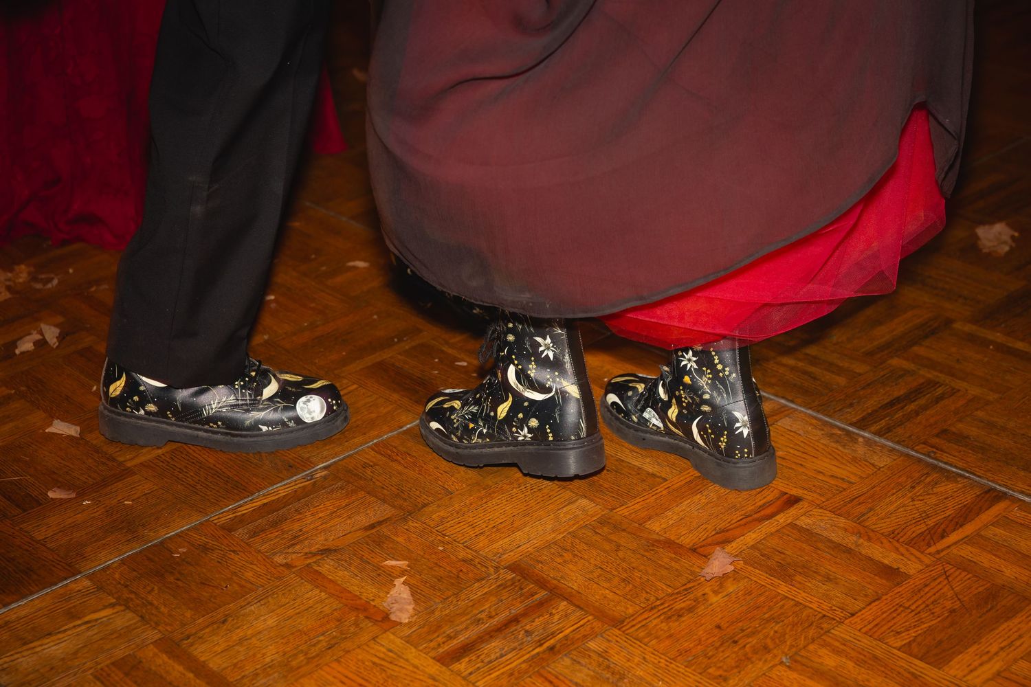A series of low angle photos showing feet and shoes on a wooden parquet floor.