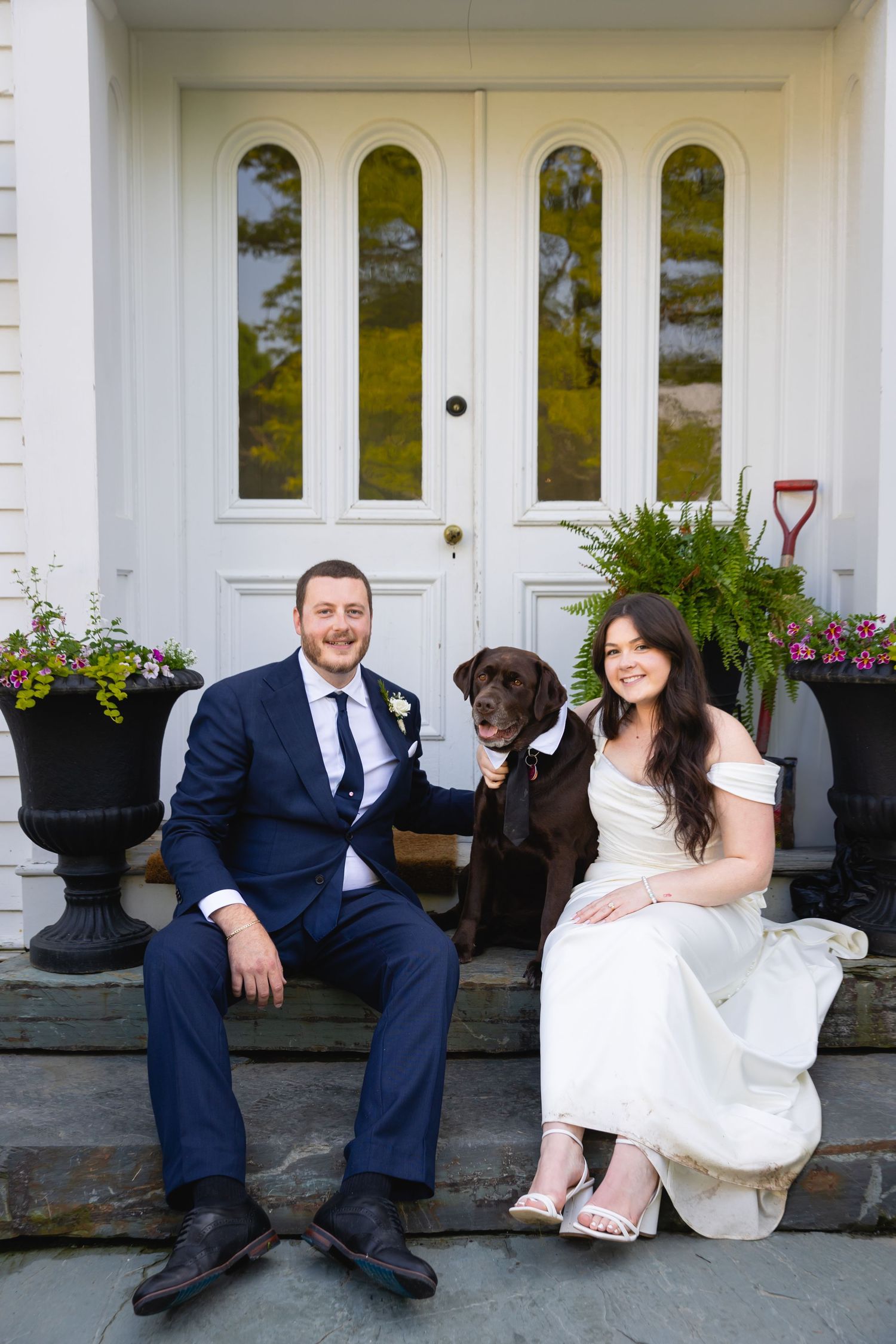 A sequence of four wedding photos showing a couple sitting and posing playfully on outdoor white porch steps.