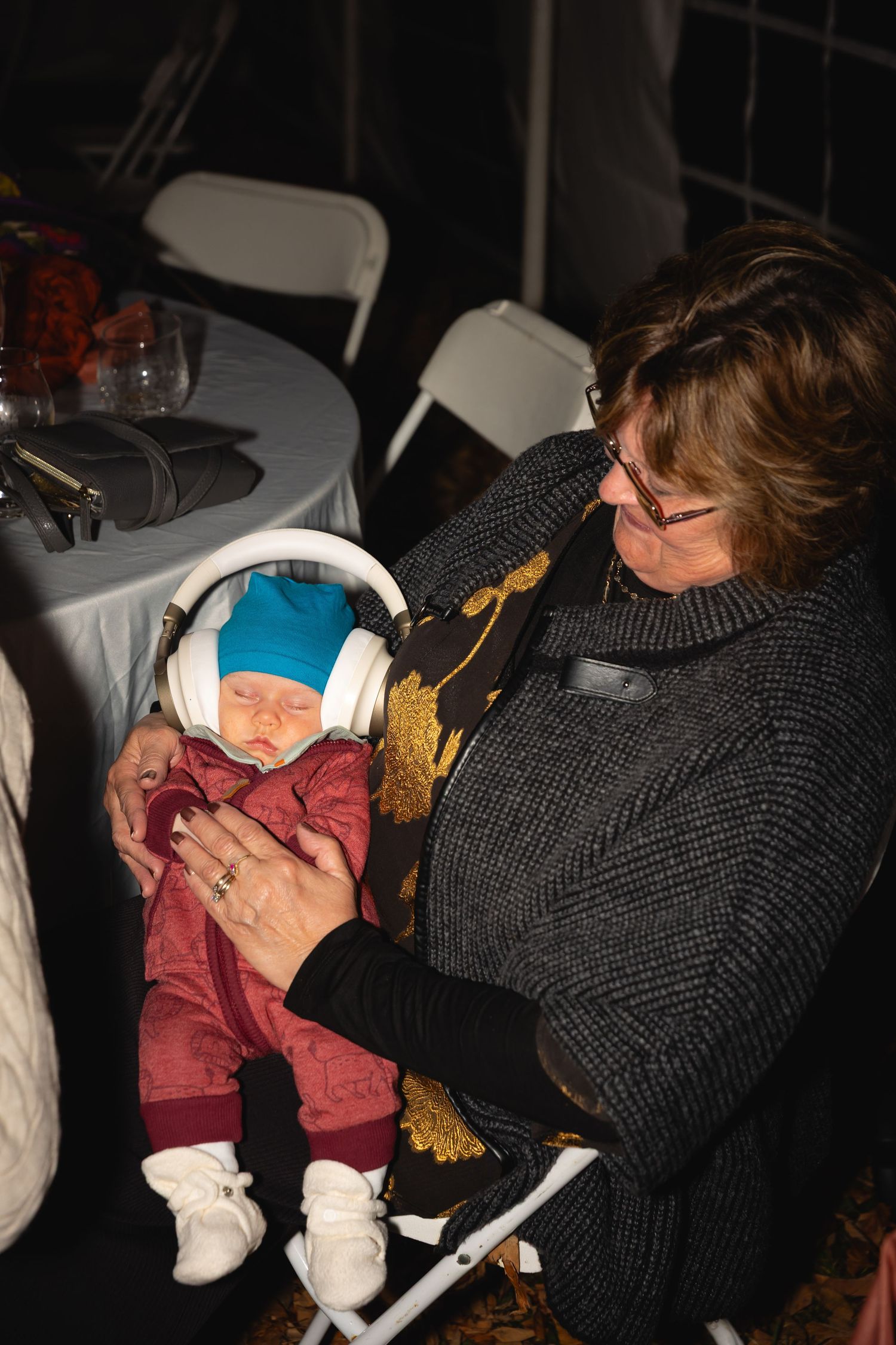 A series of photos showing someone in a dark sweater sleeping in what appears to be an airplane seat.