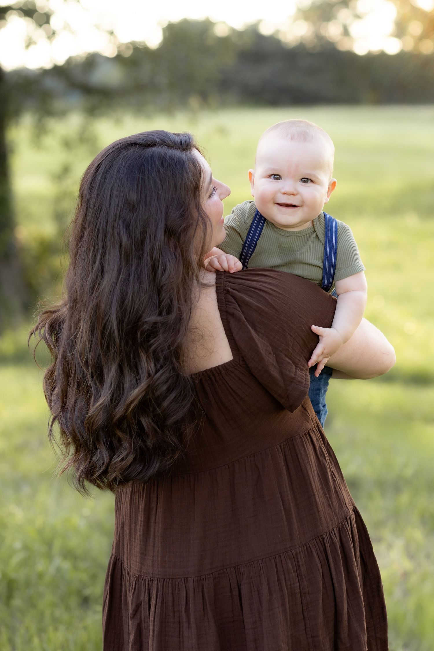 Family Pictures in a grass field at sunset near Dothan, Alabama