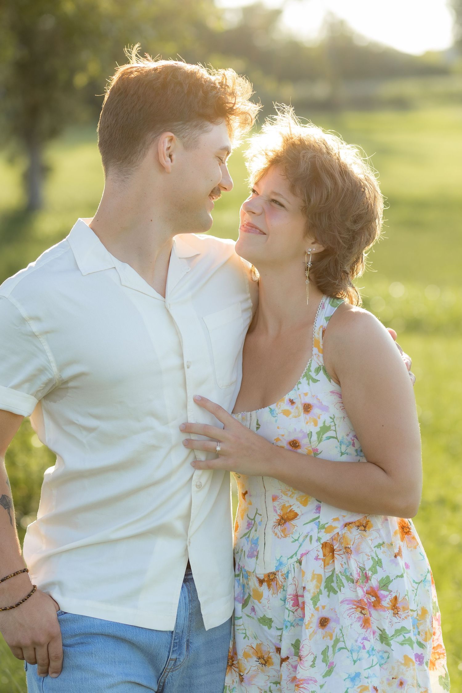 Romantic Couples photos in a tall grass field at sunset near Dothan, Alabama