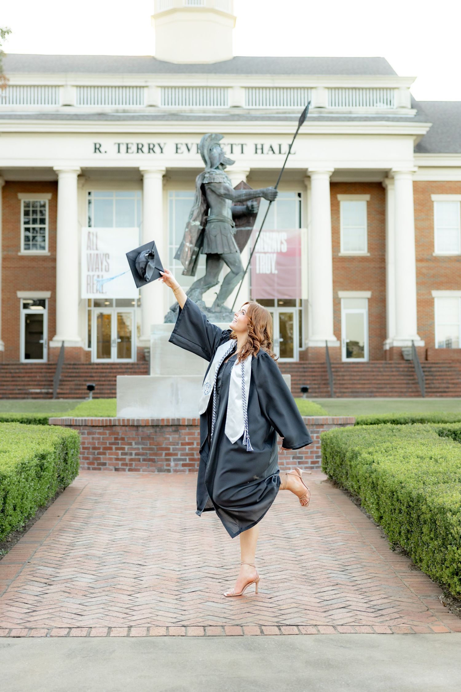 Senior cap and gown portraits at Troy University Dothan Campus