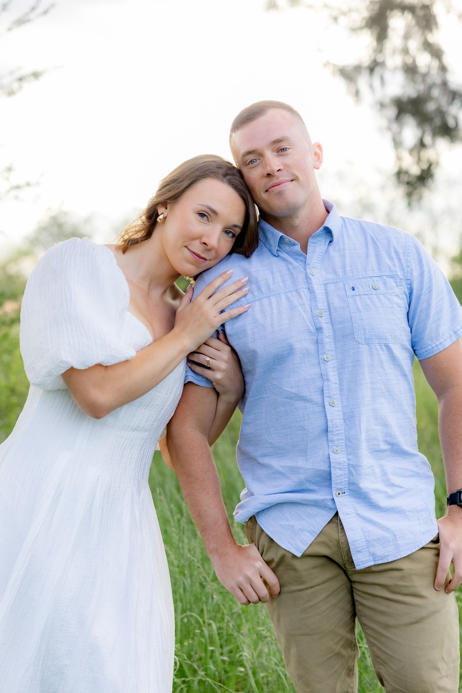 Storytelling romantic couple photos in a tall grass field at sunset in Dothan, Alabama