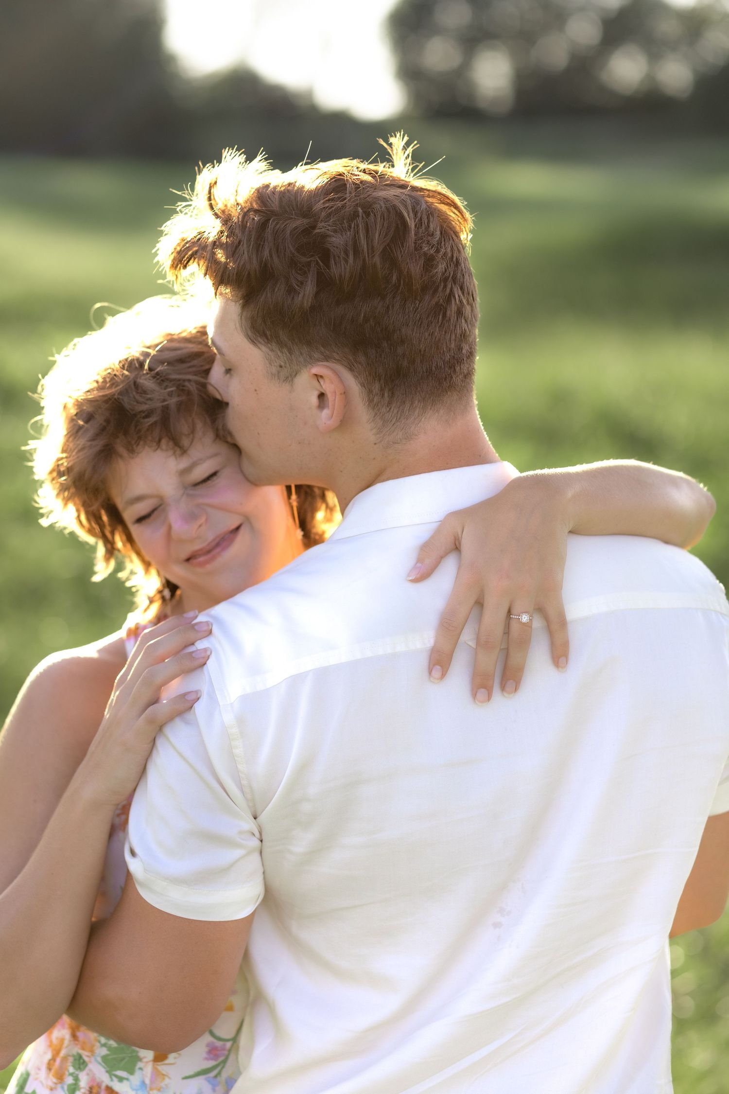 Romantic Couples photos in a tall grass field at sunset near Dothan, Alabama