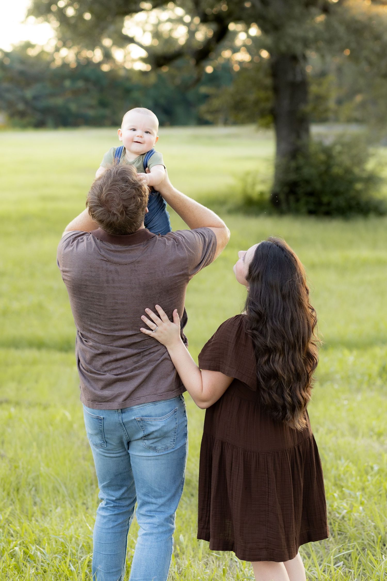 Family Pictures in a grass field at sunset near Dothan, Alabama