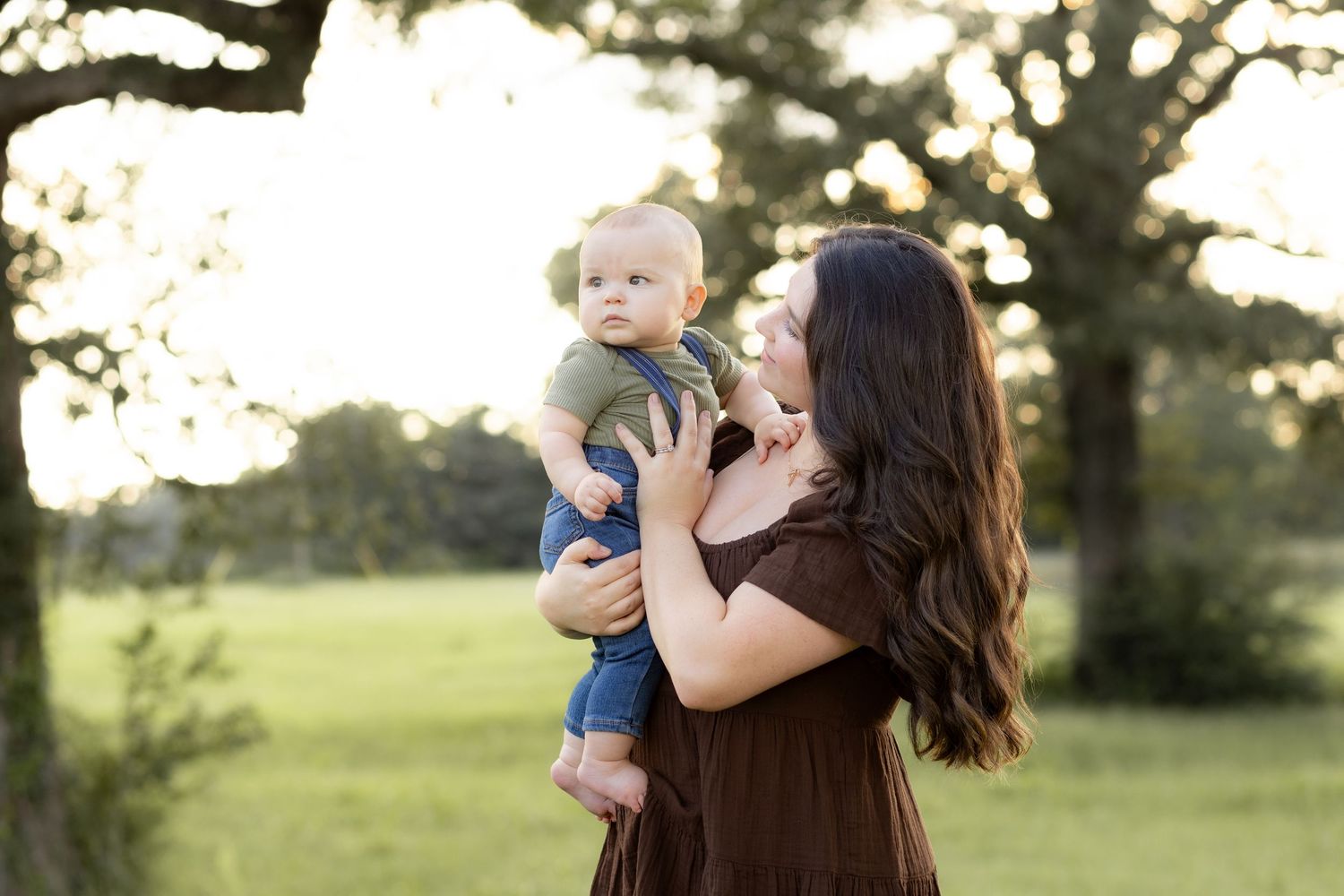 Family Pictures in a grass field at sunset near Dothan, Alabama