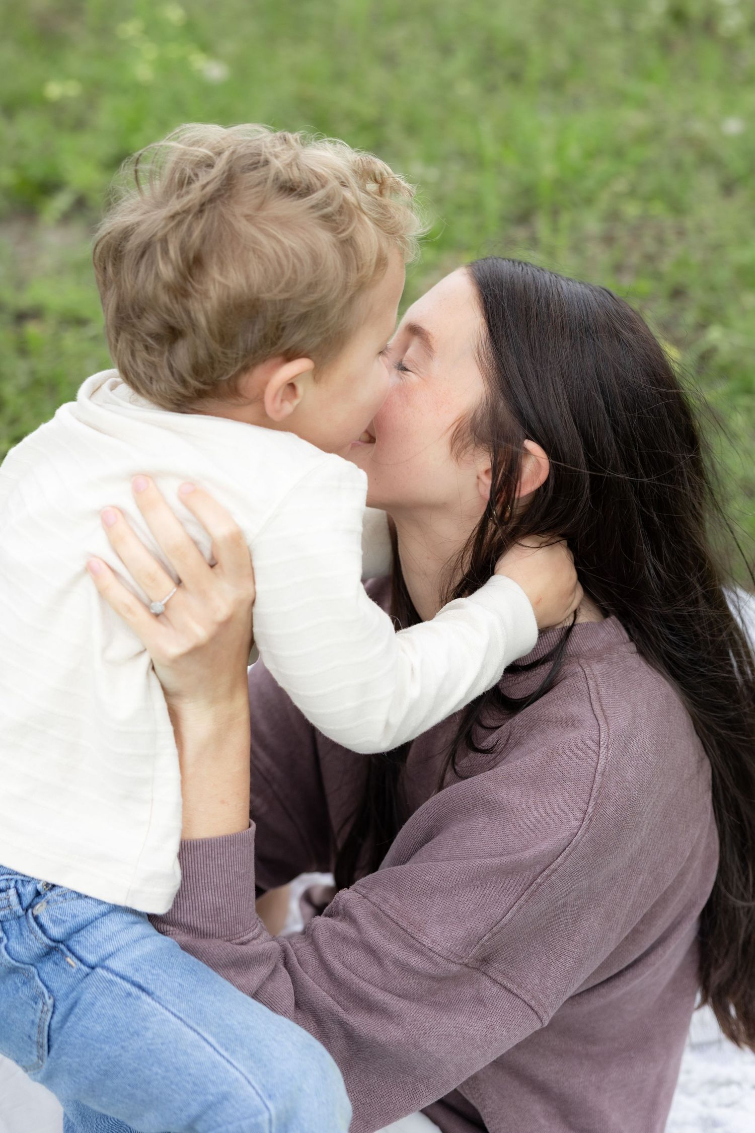 Candid family photos in a grass field | Dothan, Alabama Lifestyle Portrait Photographer