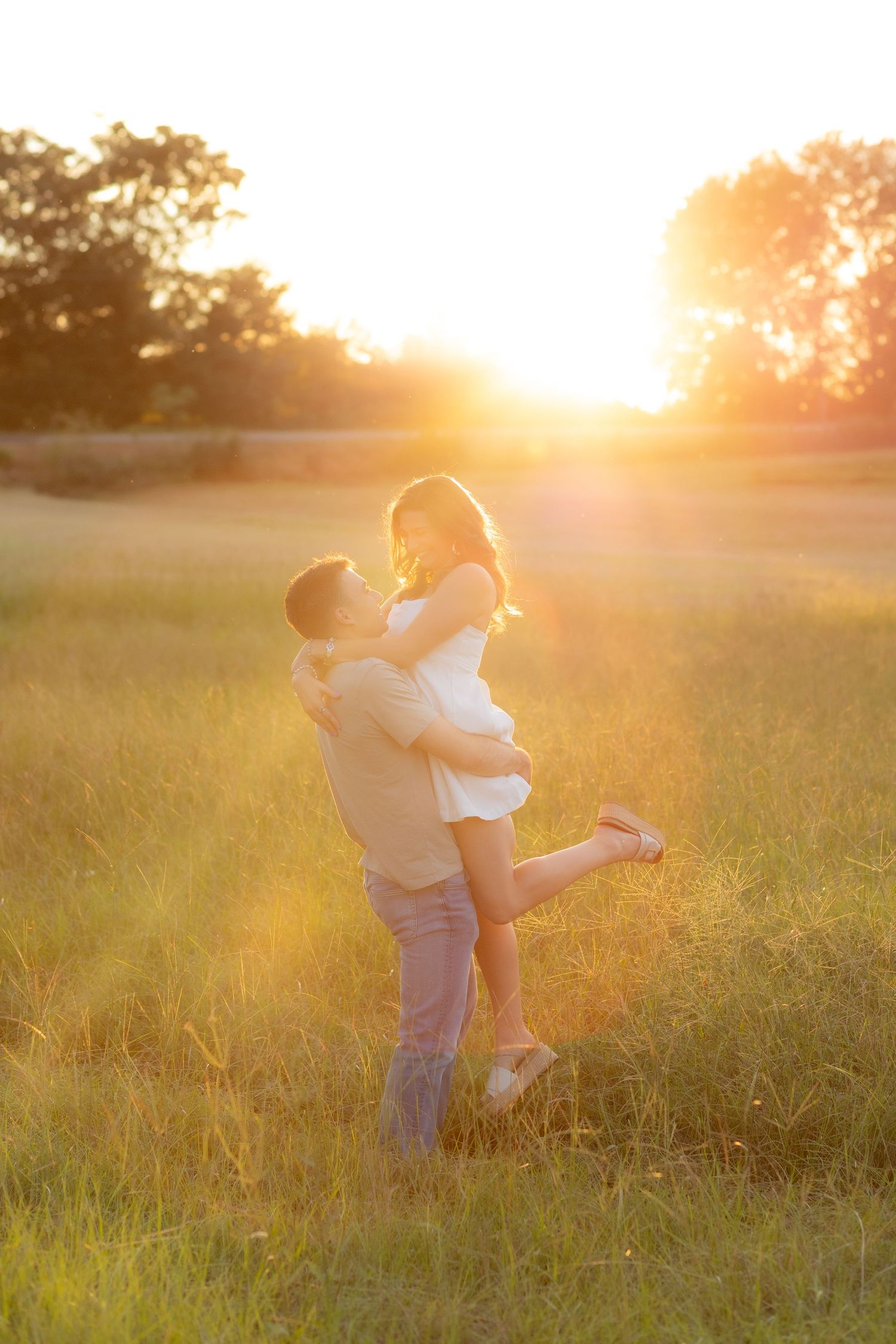 Couple Photos in a grass field at sunset near Dothan, Alabama