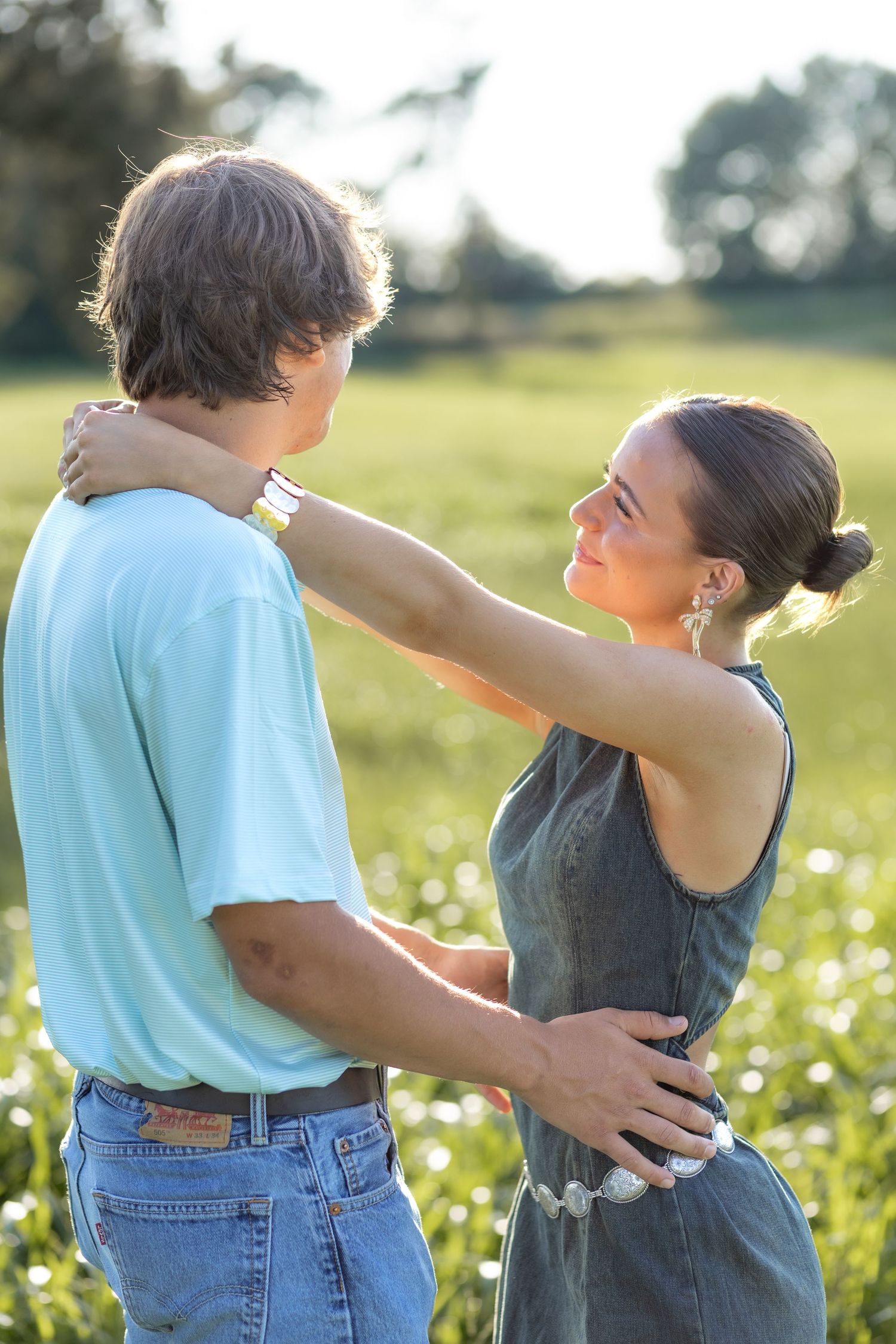 Romantic Couples photos in a tall grass field at sunset near Dothan, Alabama