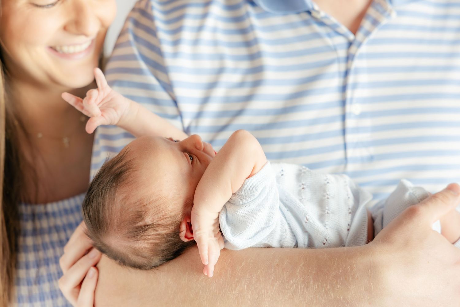 Family holding their baby in a studio in Dothan, Alabama