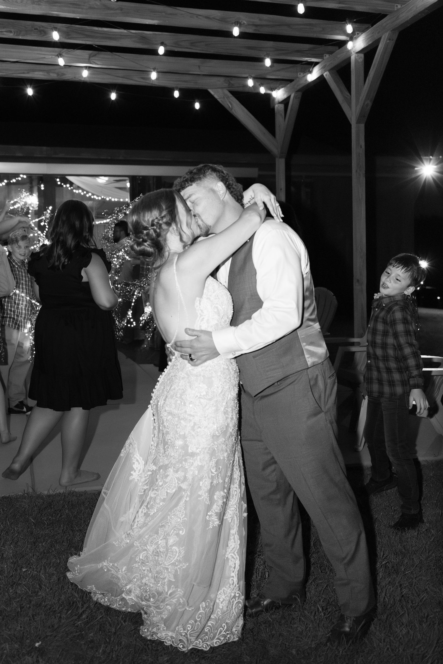Bride and groom exit through sparklers at their wedding at Hilltop Acres Wicksburg, Alabama
