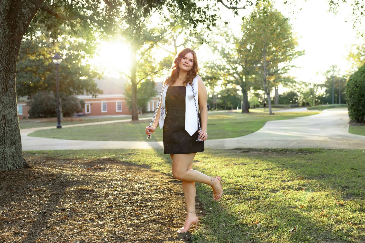 Senior portraits during sunset at Troy University Dothan Campus