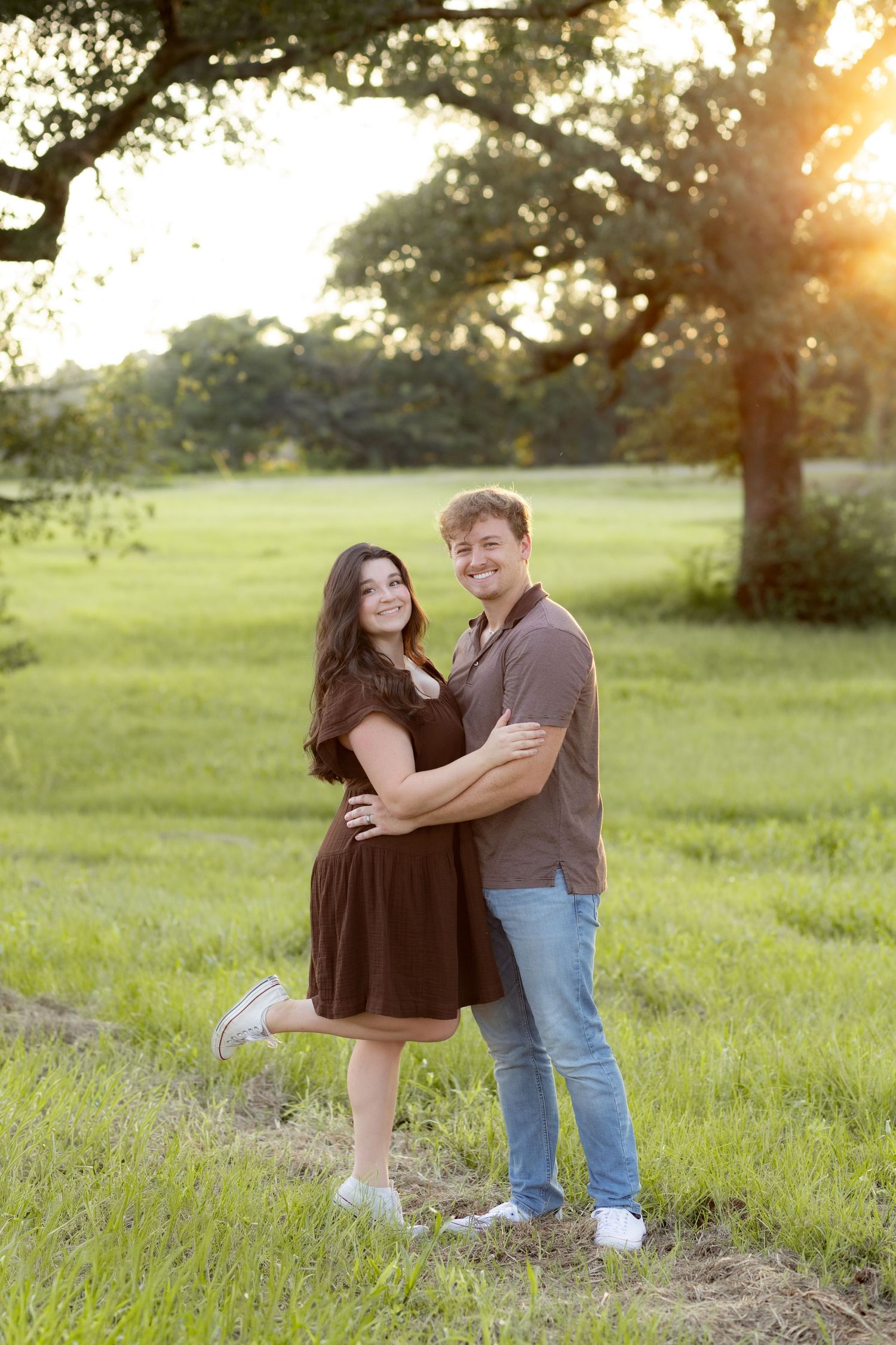Family Pictures in a grass field at sunset near Dothan, Alabama