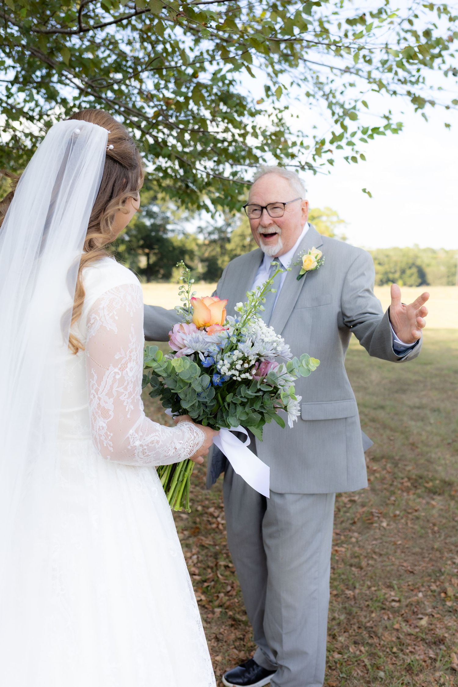 Bride and grandfather first look at wedding venue Dalrymple Farms Enterprise, Alabama