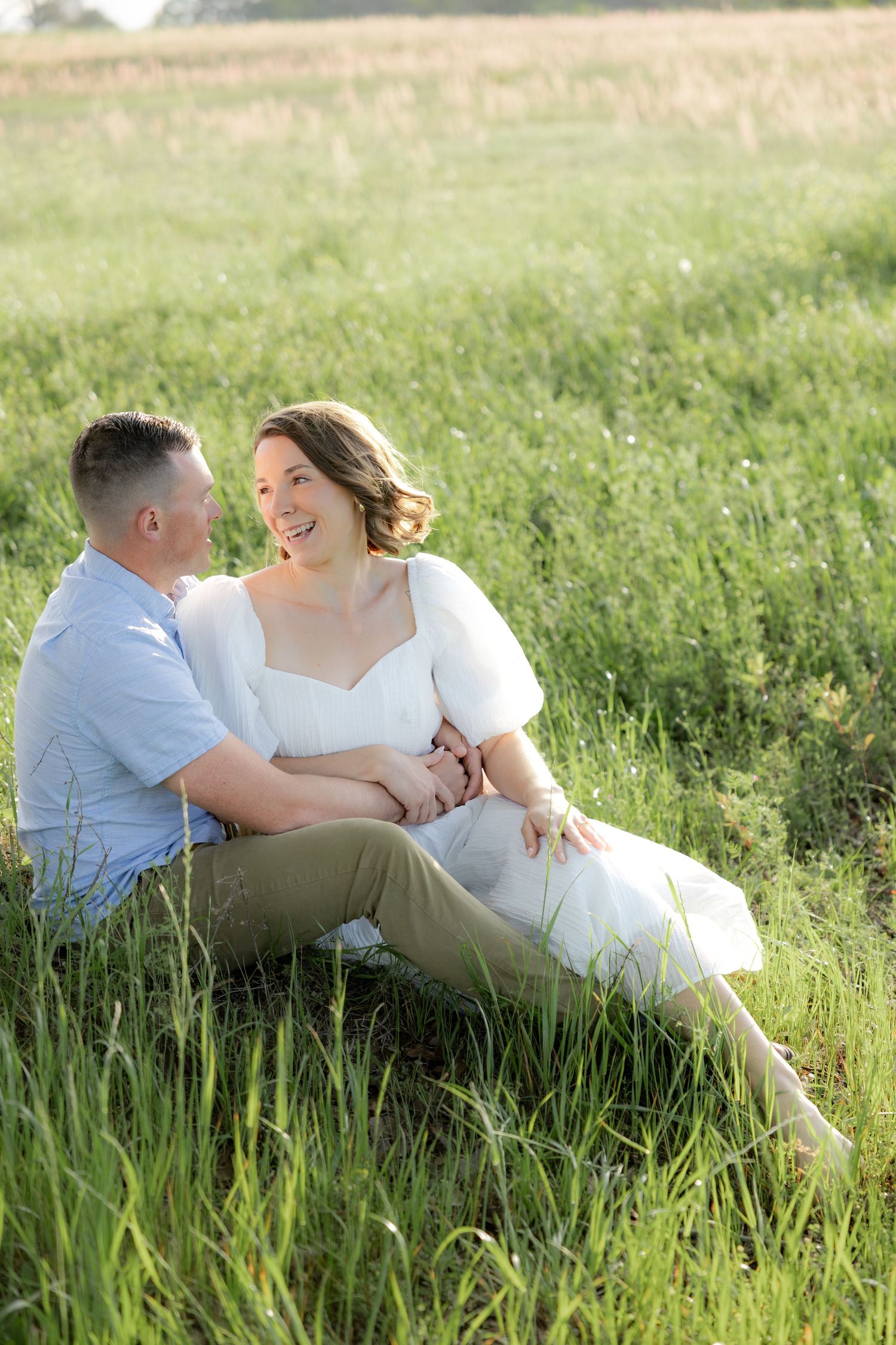 Storytelling romantic couple photos in a tall grass field at sunset in Dothan, Alabama