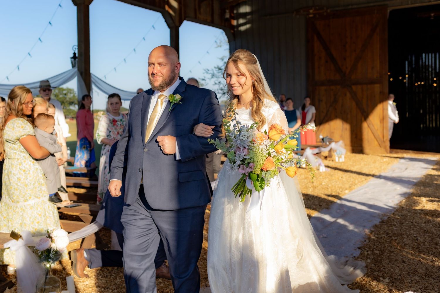 Father and bride walking down the aisle at Dalrymple Farms Enterprise, Alabama