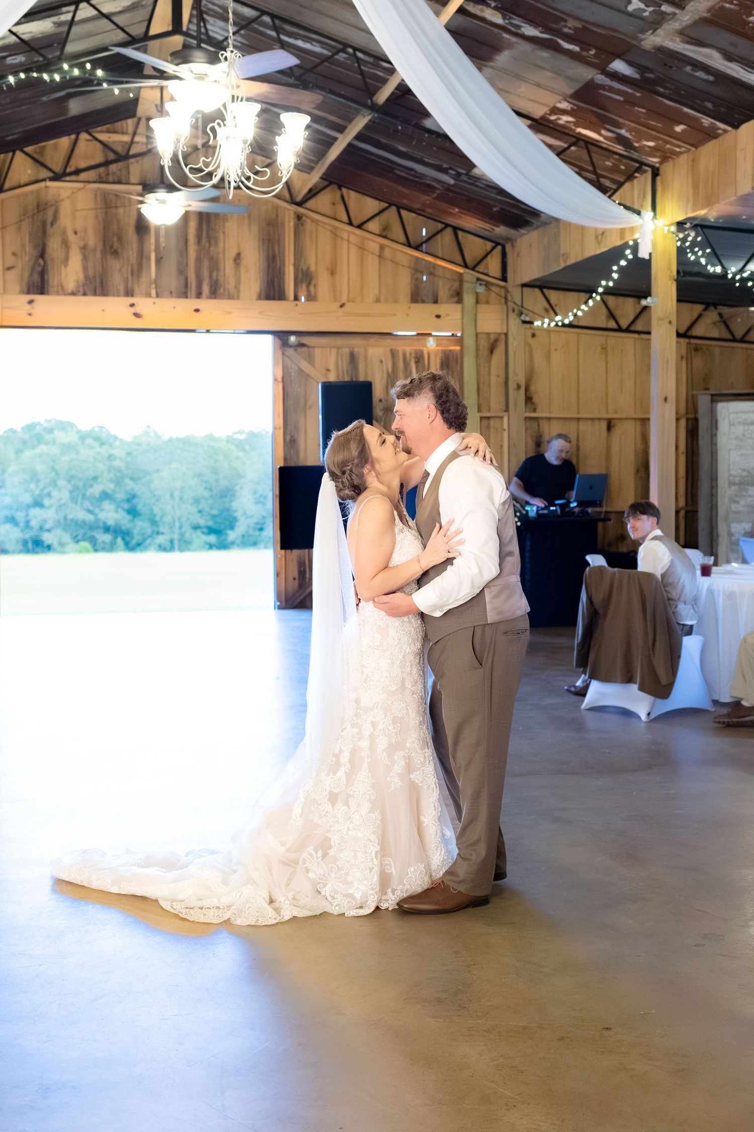 Bride and groom dance at a wedding at Hilltop Acres Wicksburg, Alabama