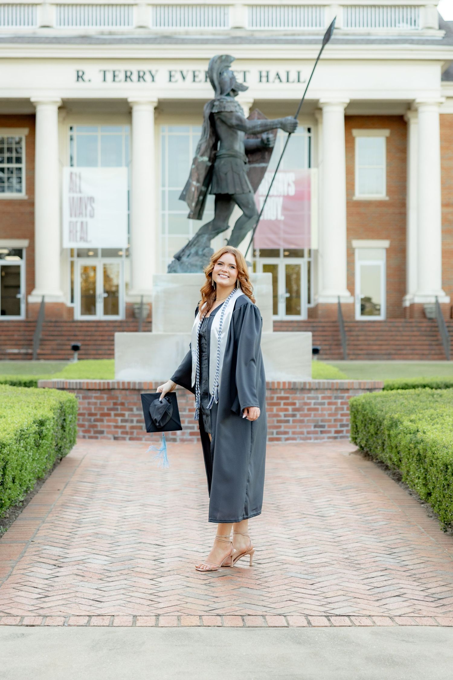 Senior cap and gown portraits at Troy University Dothan Campus