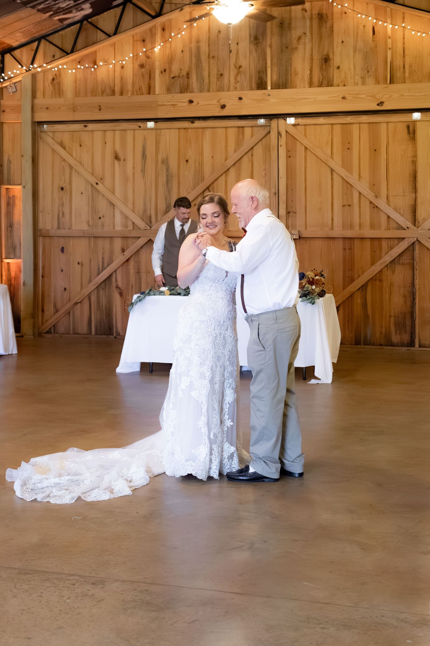 Bride and grandfather dance at a wedding at Hilltop Acres Wicksburg, Alabama