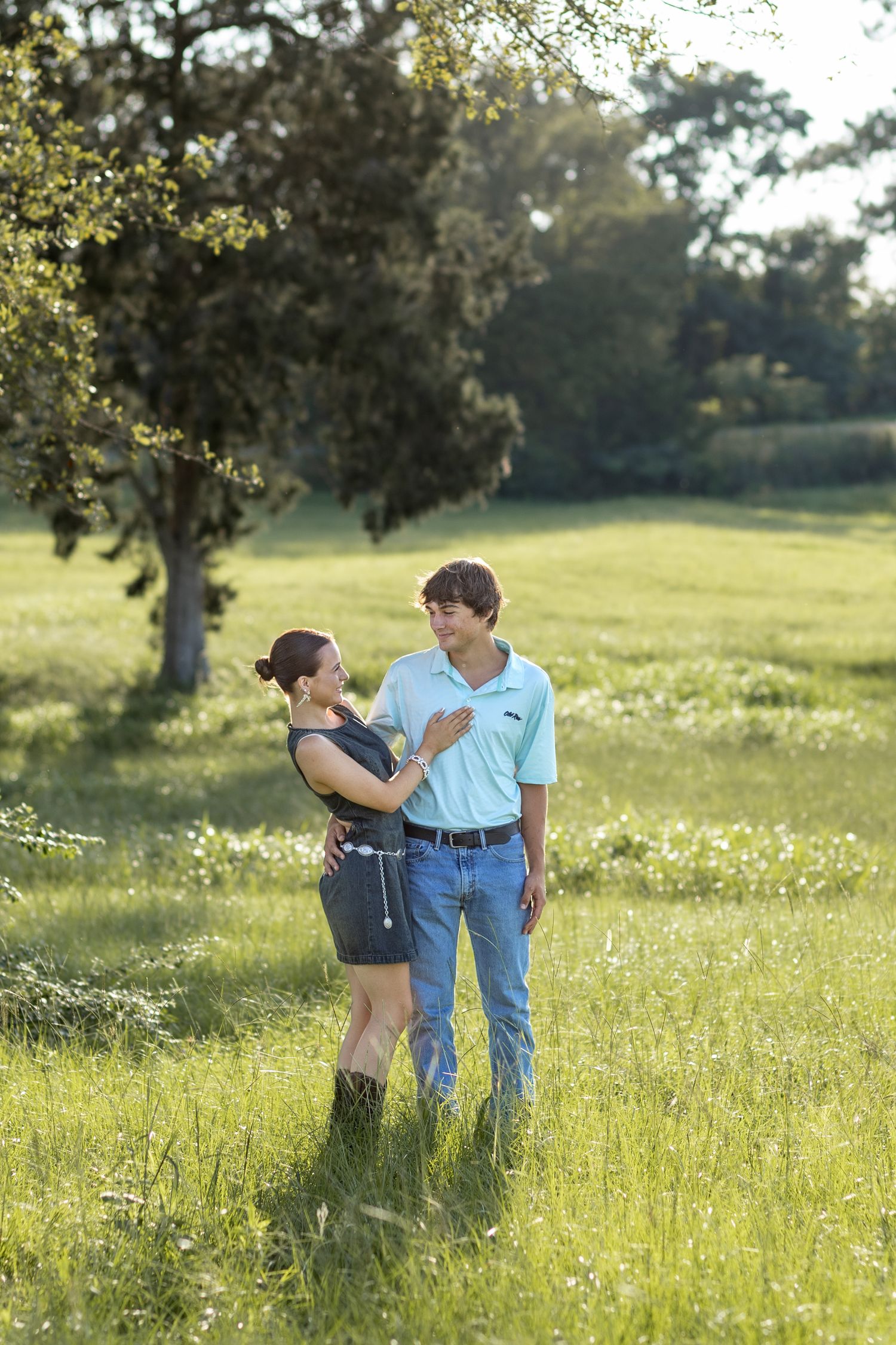 Romantic Couples photos in a tall grass field at sunset near Dothan, Alabama