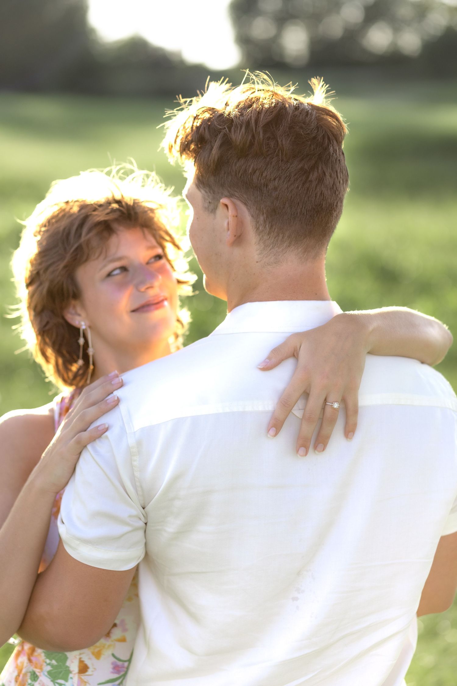 Romantic Couples photos in a tall grass field at sunset near Dothan, Alabama